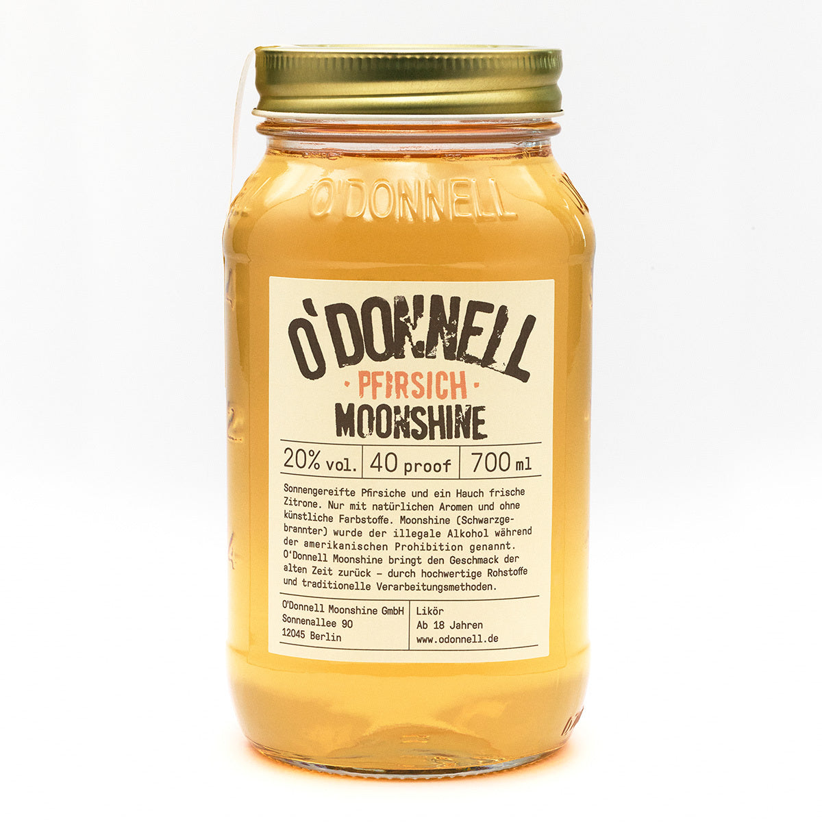 O'Donnell Pfirsich Moonshine-Glas auf weißem Hintergrund