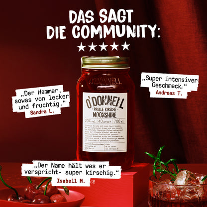 O'Donnell Moonshine Pralle Kirsche – Kundenbewertungen: „Das sagt die Community" mit 5 Sternen und Zitaten, roter Hintergrund mit Kirschen