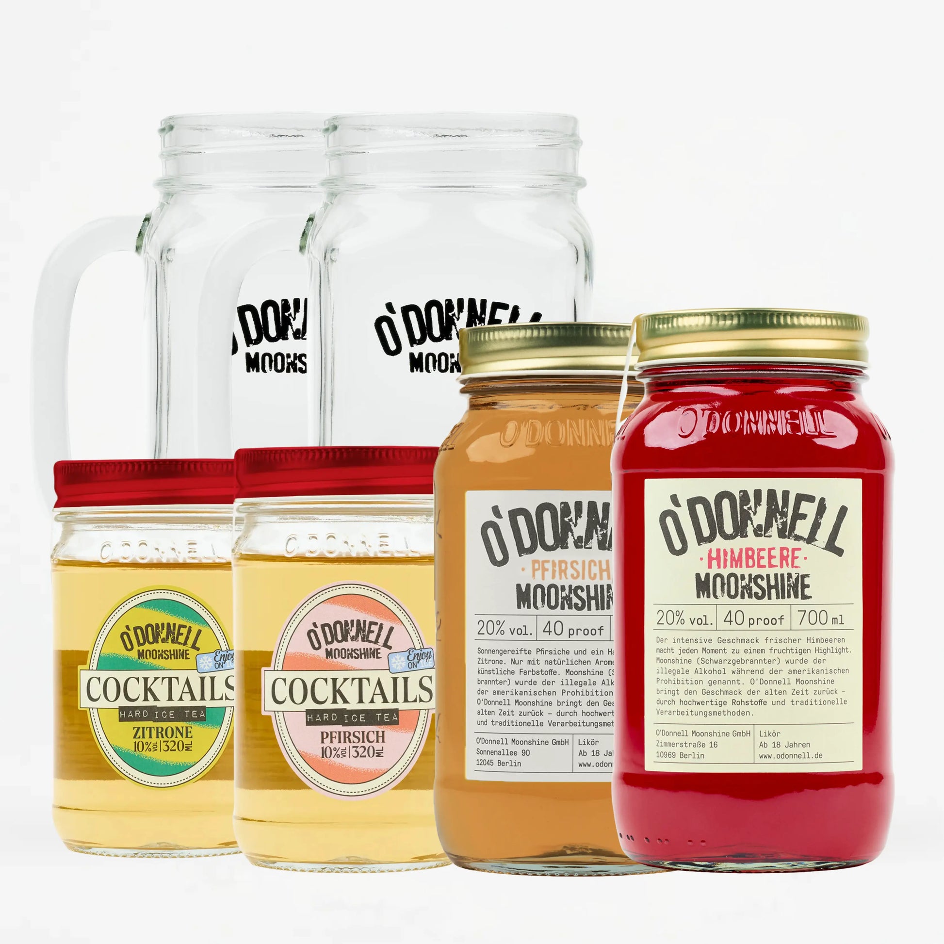 Produkt-Freisteller der O'Donnell Moonshine Sommer-Box vor weißem Hintergrund. Zu sehen sind im Vordergrund zwei Moonshine-Flaschen (Pfirsich und Himbeere, je 700 ml) und zwei Cocktail-Mixer („Hard Ice Tea Zitrone“ und „Hard Ice Tea Pfirsich“). Im Hintergrund stehen zwei leere O'Donnell Moonshine Cocktail-Gläser mit Henkel.